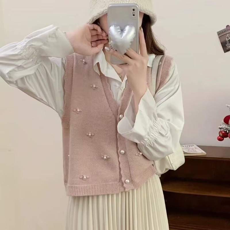 Winter Clothing Trends For Women - Gilet in maglia rosa per donna